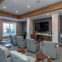 Acclaim at The Hill, senior living community offering active adult and independent living in Fredericksburg, VA, cozy theatre