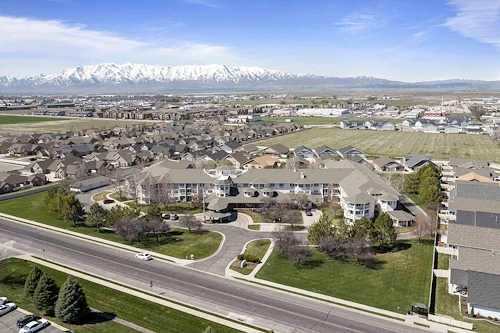 Pioneer Valley Lodge Gracious Retirement Living Hawthorn Senior Independent Living in North Logan, Utah front exterior drone view