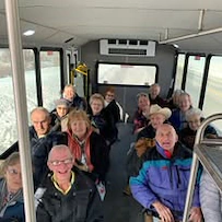 Pioneer Valley Lodge Gracious Retirement Living Hawthorn Senior Independent Living in North Logan, Utah residents on the transportation bus