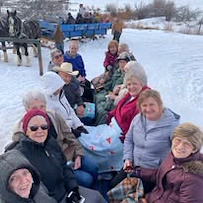 Pioneer Valley Lodge Gracious Retirement Living Hawthorn Senior Independent Living in North Logan, Utah residents outside in the winter